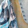 Abracazebra Teal scarf styled in buttonhole