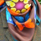 Butterfly Kaleidoscope Autumn scarf styled with jacket